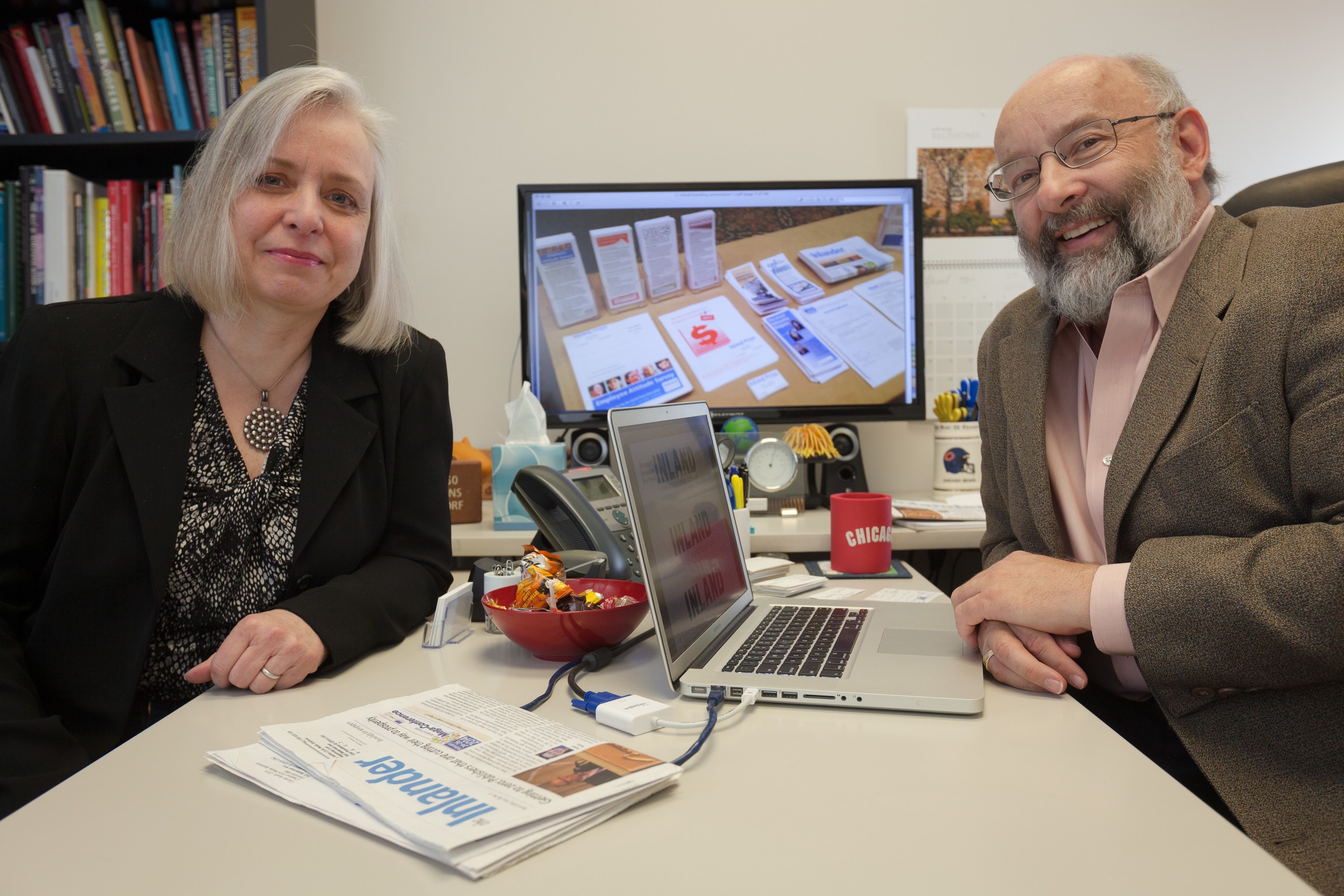 Lynn Rognsvoog and Bill Ostendorf working on a rebranding campaign for the Inland Press Association.